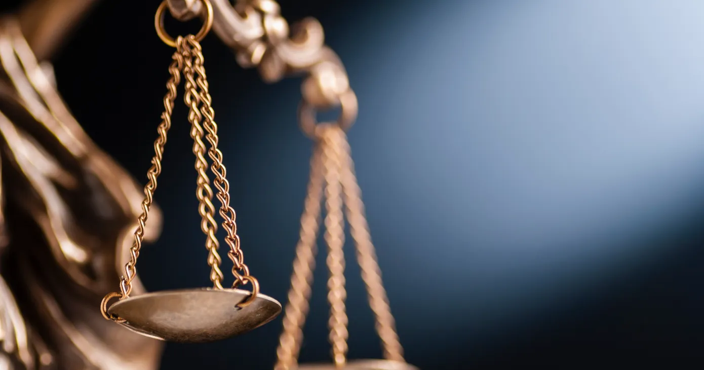Close up on the scales of justice